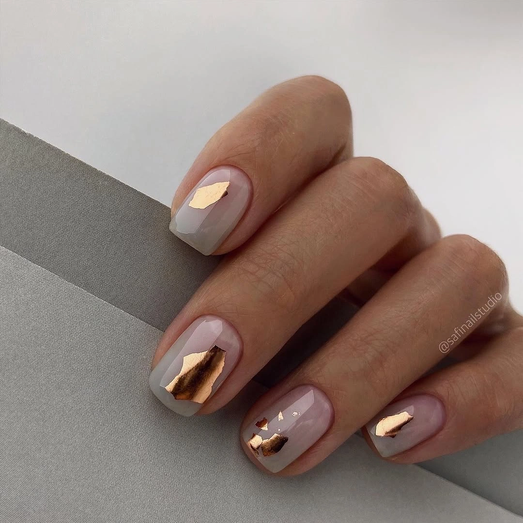 creative fall nail art 2026 Soft Grey French With Gold Foil Details
