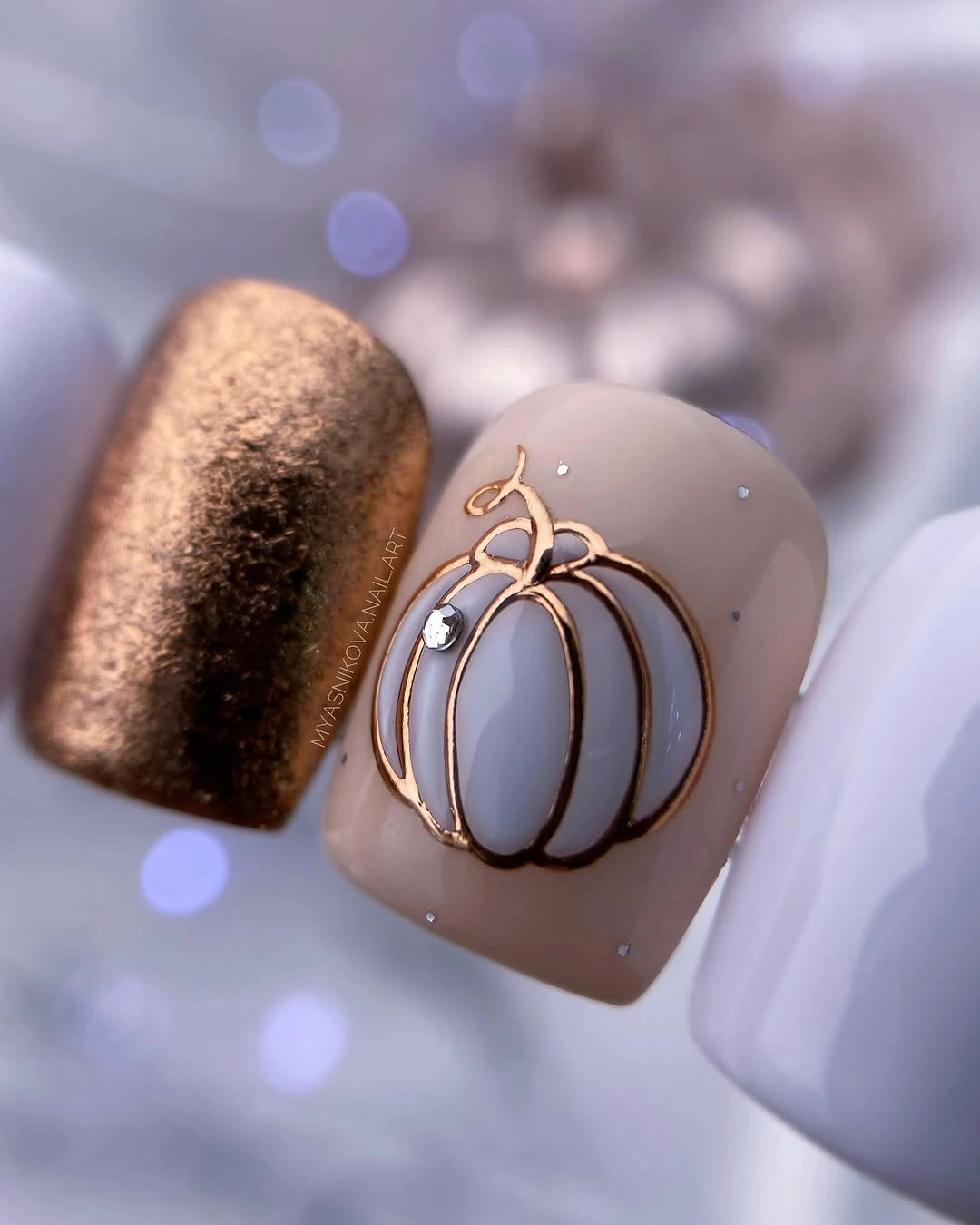 creative fall nail art 2026 Minimalist Pumpkin Outline In Warm Neutrals