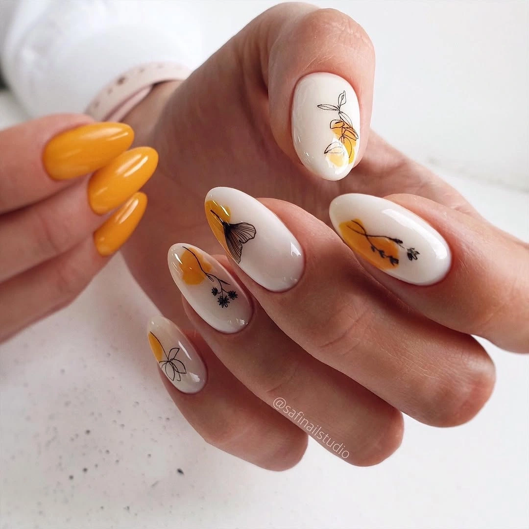 creative fall nail art 2026 Modern Botanical Nails With Mustard Accents