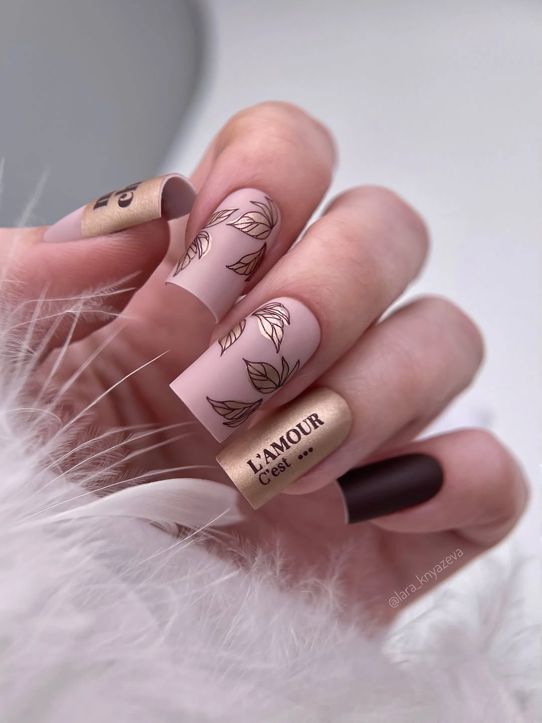 creative fall nail art 2026 Matte Nude Leaves With Golden Accents