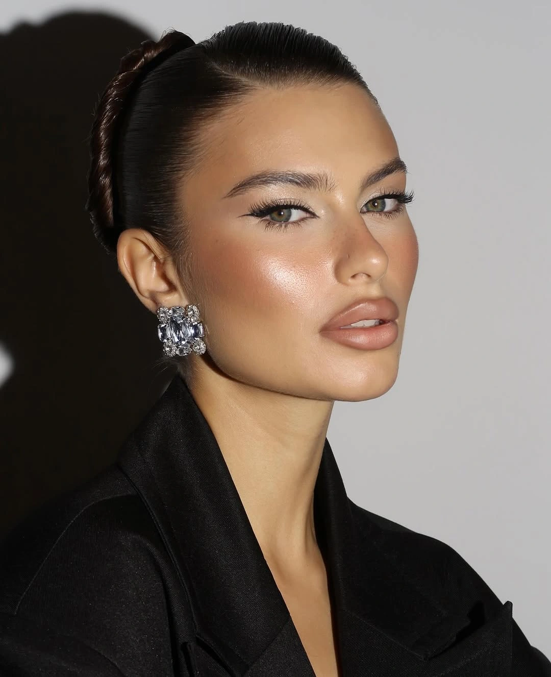 cute fall hairstyles for office 2026 Glossy Twisted Ponytail With Runway Finish