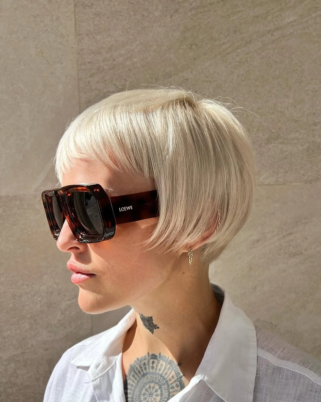 fall blonde hair colour 2026 French Blonde Pixie With Soft Precision