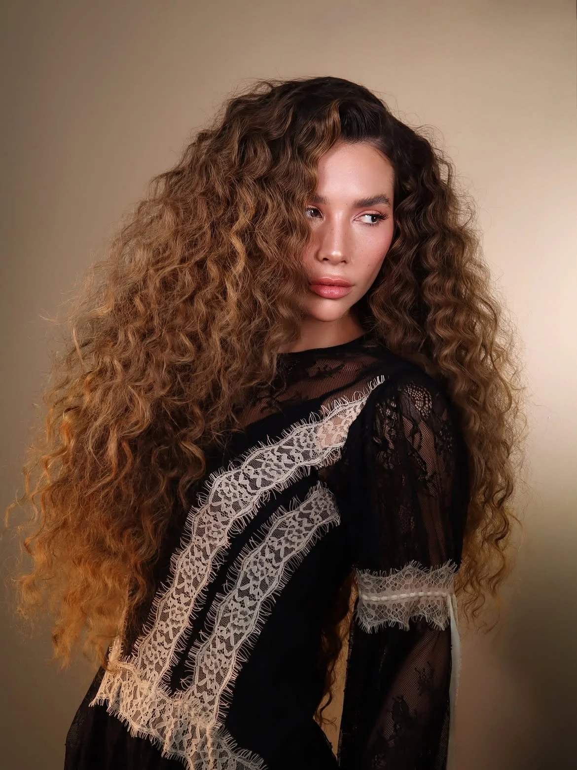 fall brunette hair colour 2026 Soft Chocolate Curls Full Of Natural Volume