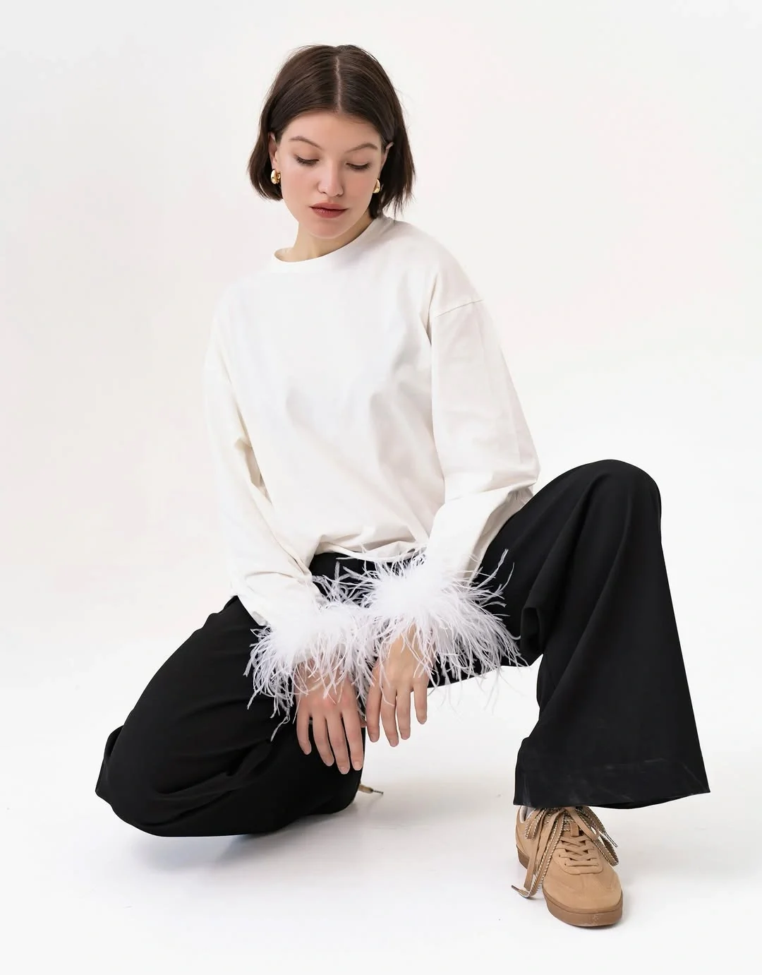 fall long sleeve tops 2026 Feather Cuffs That Turn a Minimal Top Into a Statement