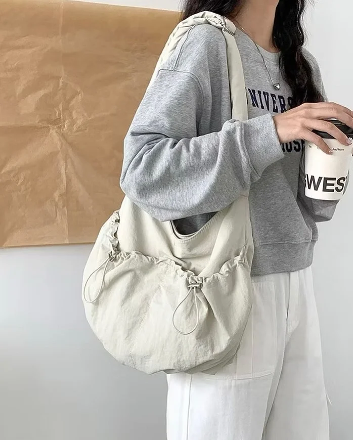 fall outftis with Crossbody bag 2026 Relaxed Drawstring Bags That Make Casual Days Feel Fresh