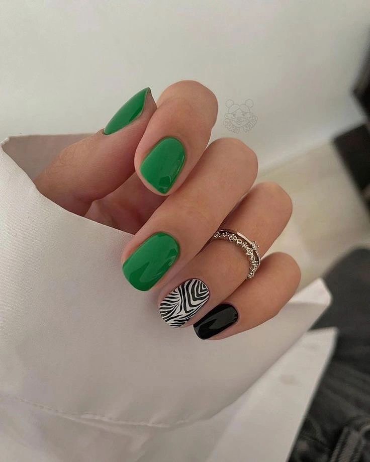 gorgeous fall manicure 2026 Emerald Green With Modern Zebra Accent