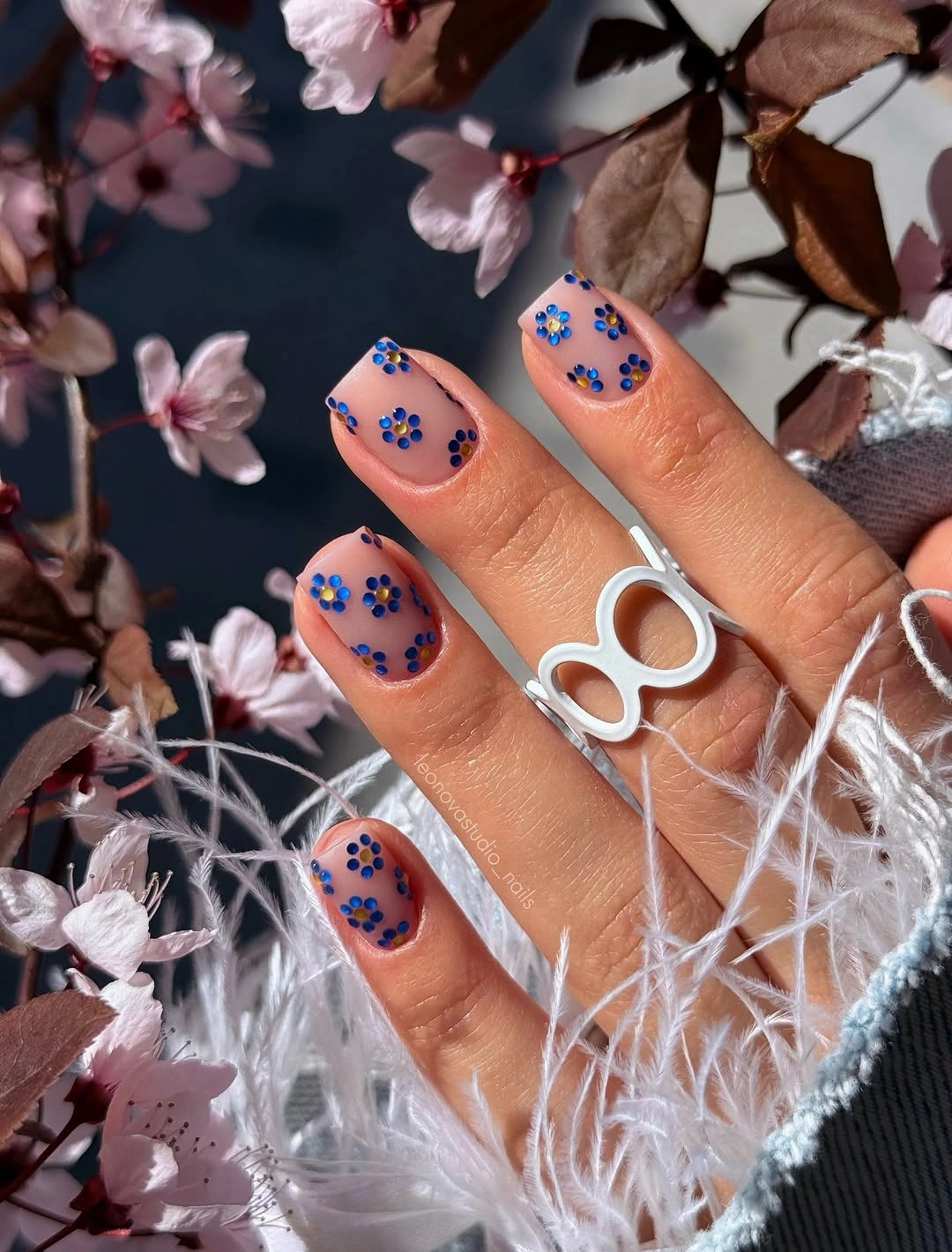 gorgeous fall manicure 2026 Delicate Blue Floral Short Nails