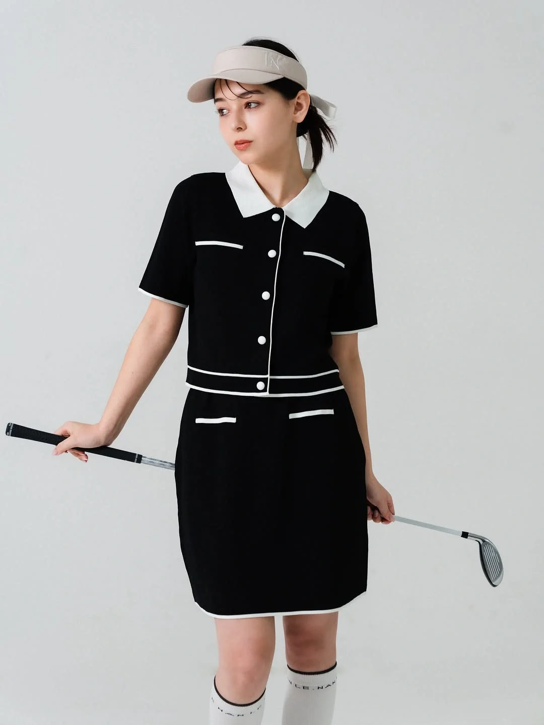 knit skirt outfits fall 2026 Classic Contrast Gives Knitwear a Polished Twist