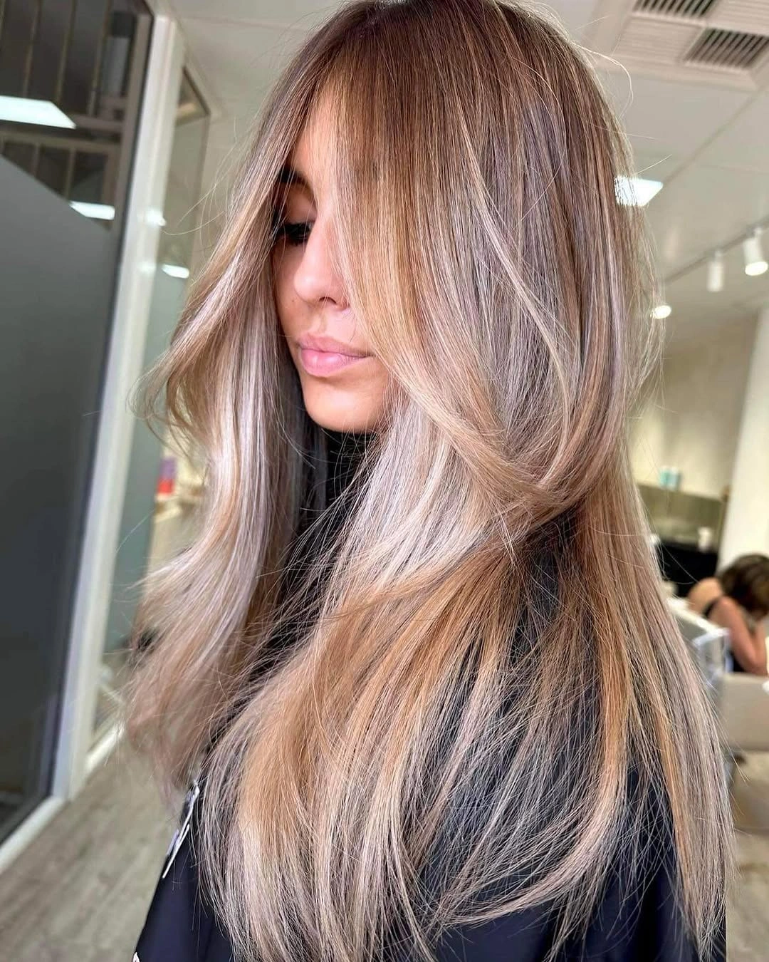 modern babylights hair ideas Creamy Face Framing Babylights With Long Layers