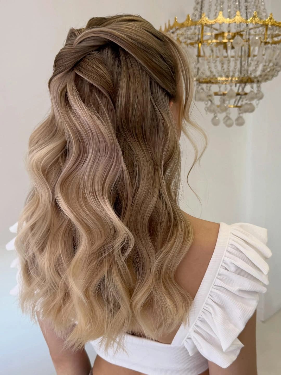 modern fall hairstyles for wedding guests 2026 Soft Twisted Half Up Hairstyle