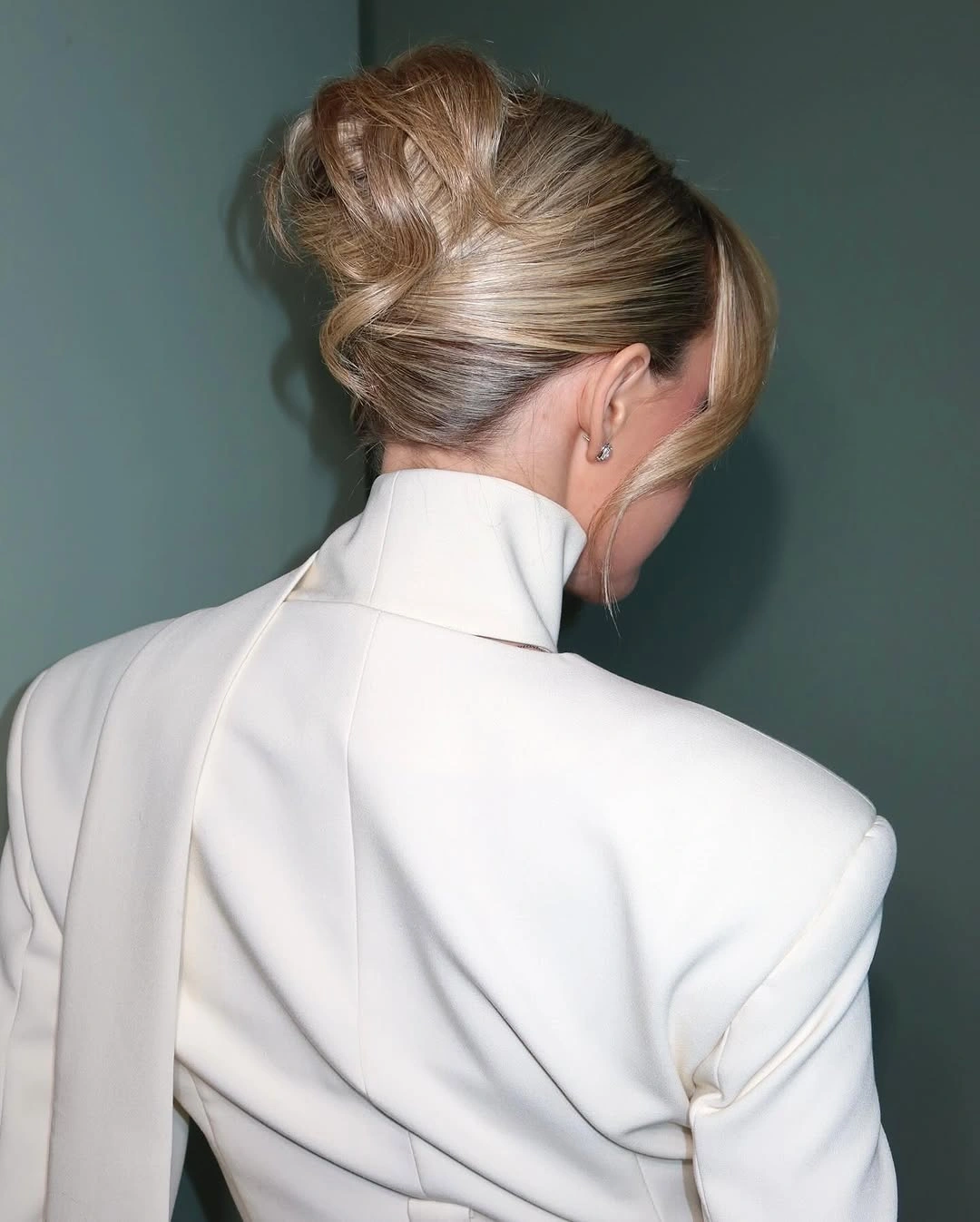 modern fall hairstyles for wedding guests 2026 Modern Sculpted High Bun
