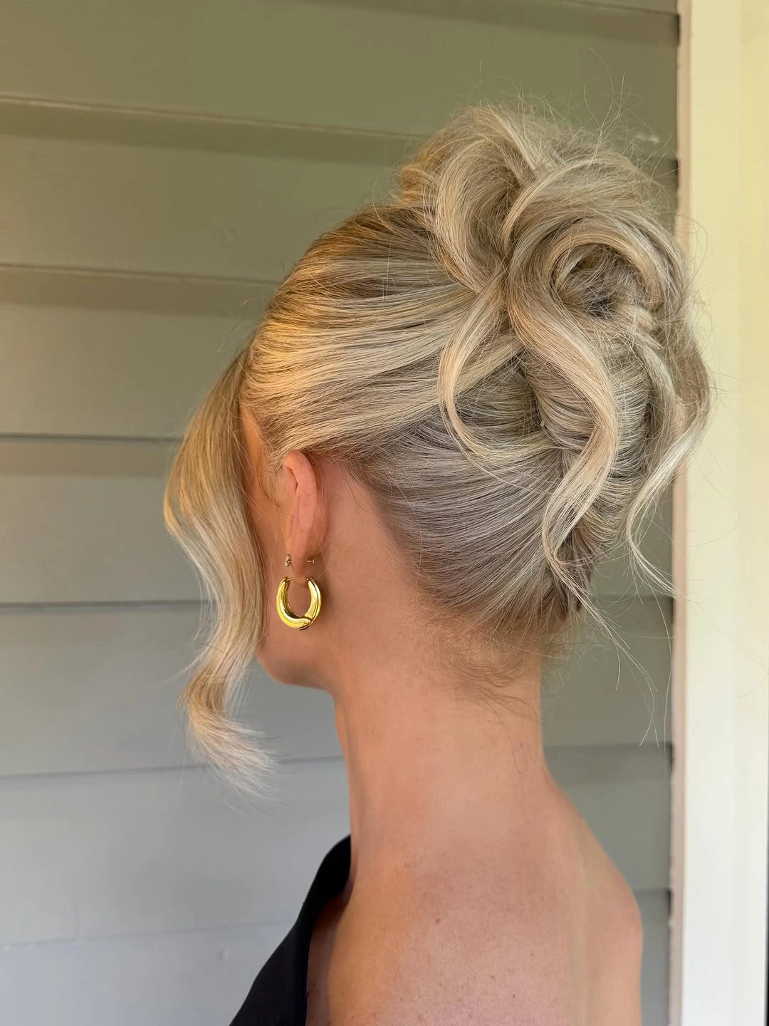 romantic bridesmaid hairstyling An Elegant Updo That Feels Soft Instead of Stiff
