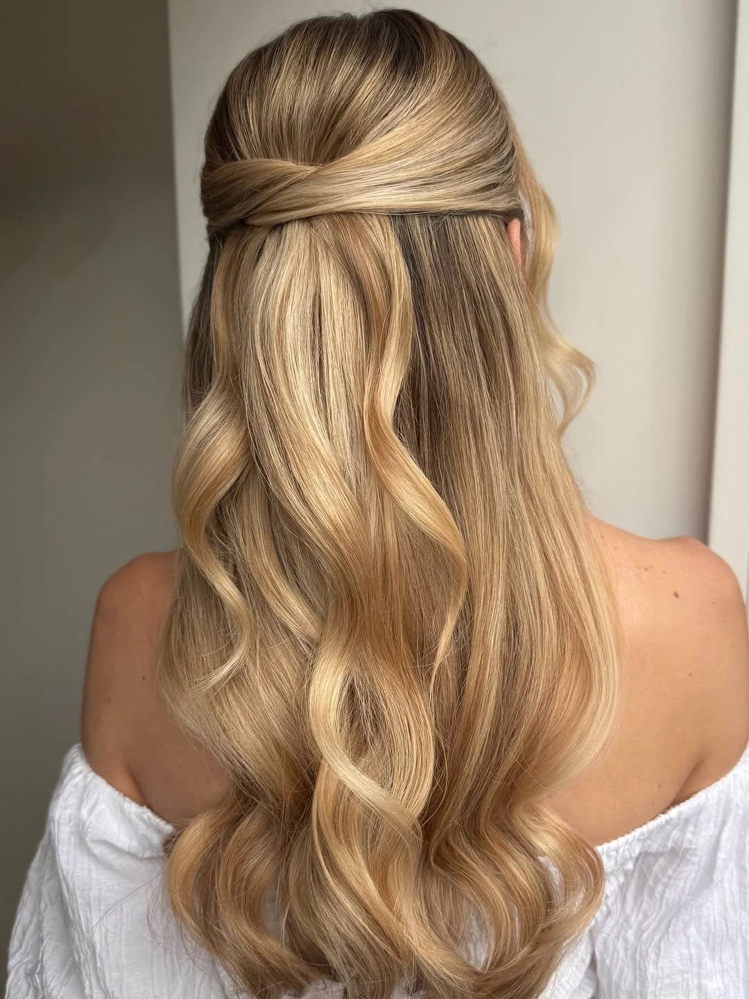 romantic bridesmaid hairstyling The Romantic Half Up Style That Never Goes Out of Fashion