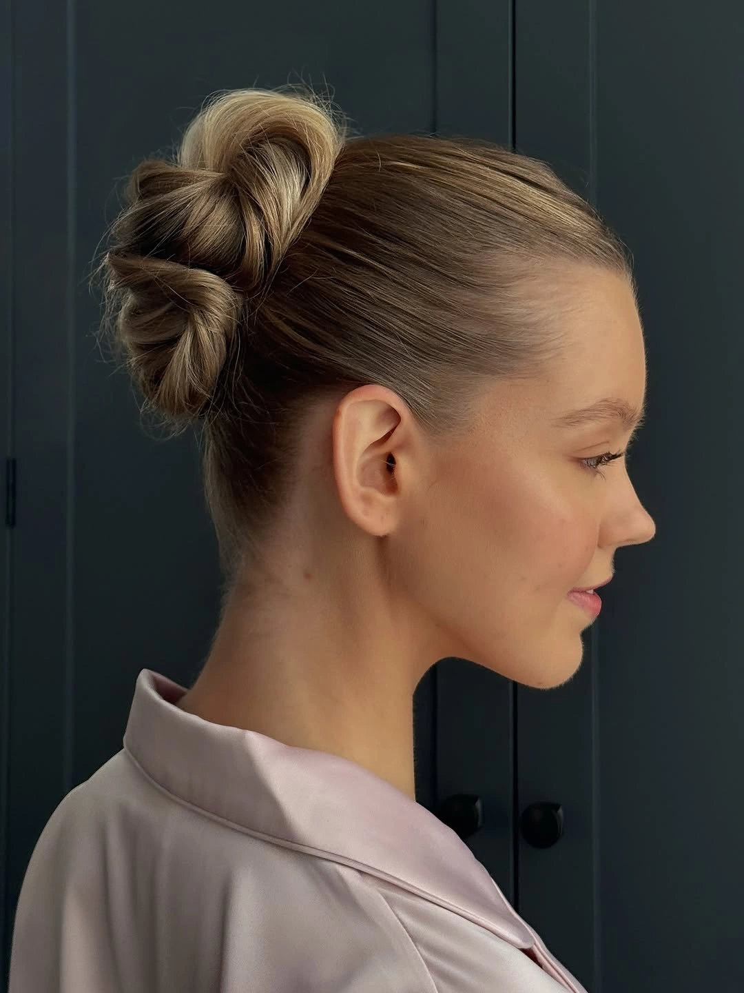 romantic bridesmaid hairstyling Twisted Junior Bun with Modern Charm
