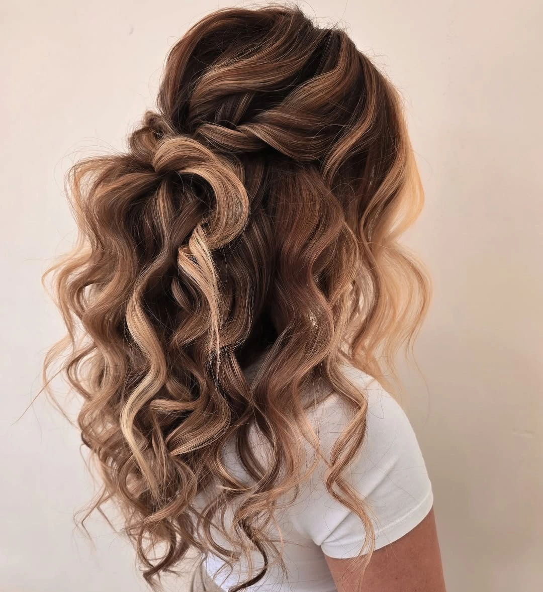 romantic bridesmaid hairstyling Soft Half Up Curls With Romantic Texture