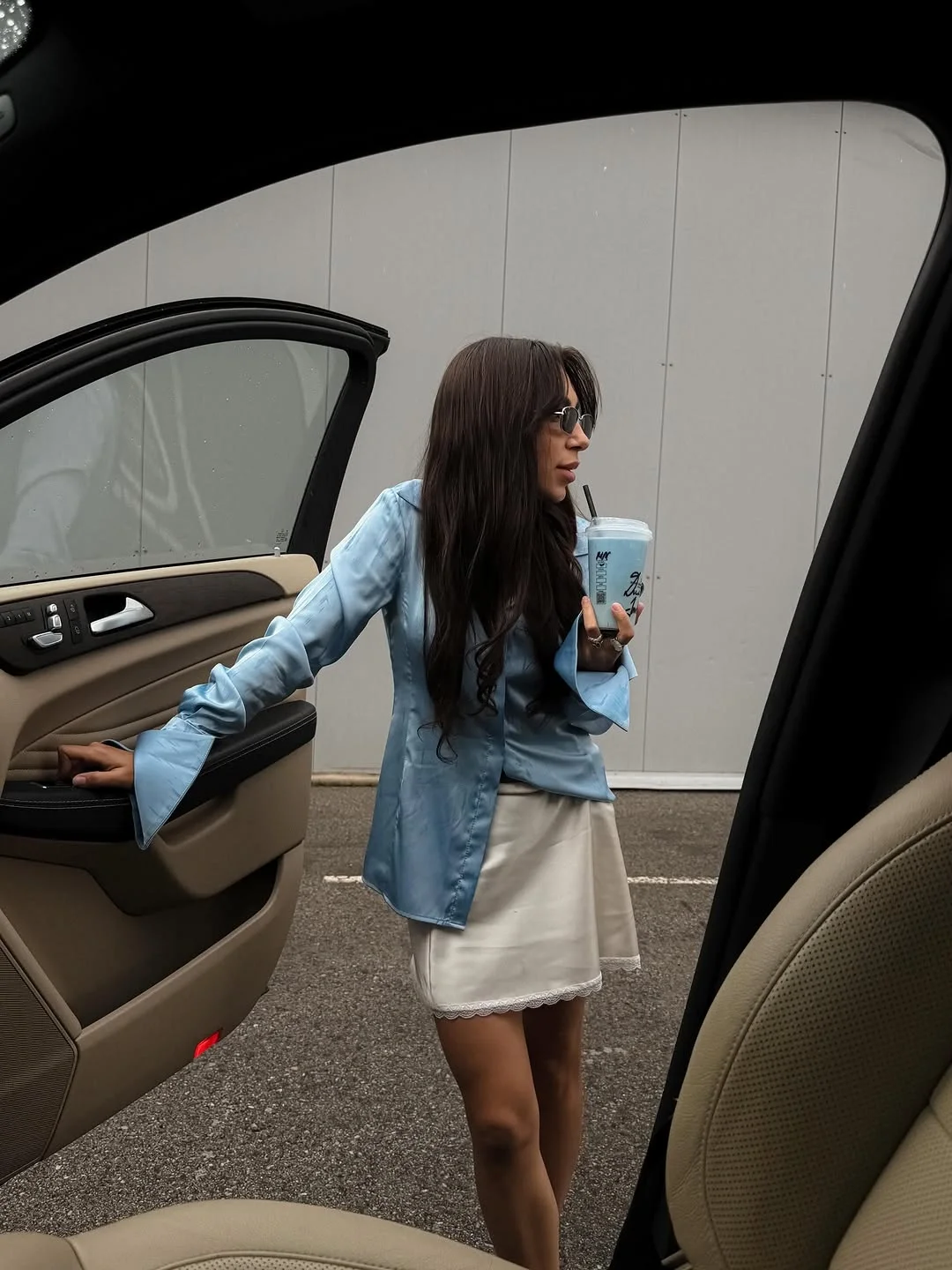 simple casual fall outfits 2026 Soft Blue Satin And Mini Skirt For Early Fall Days