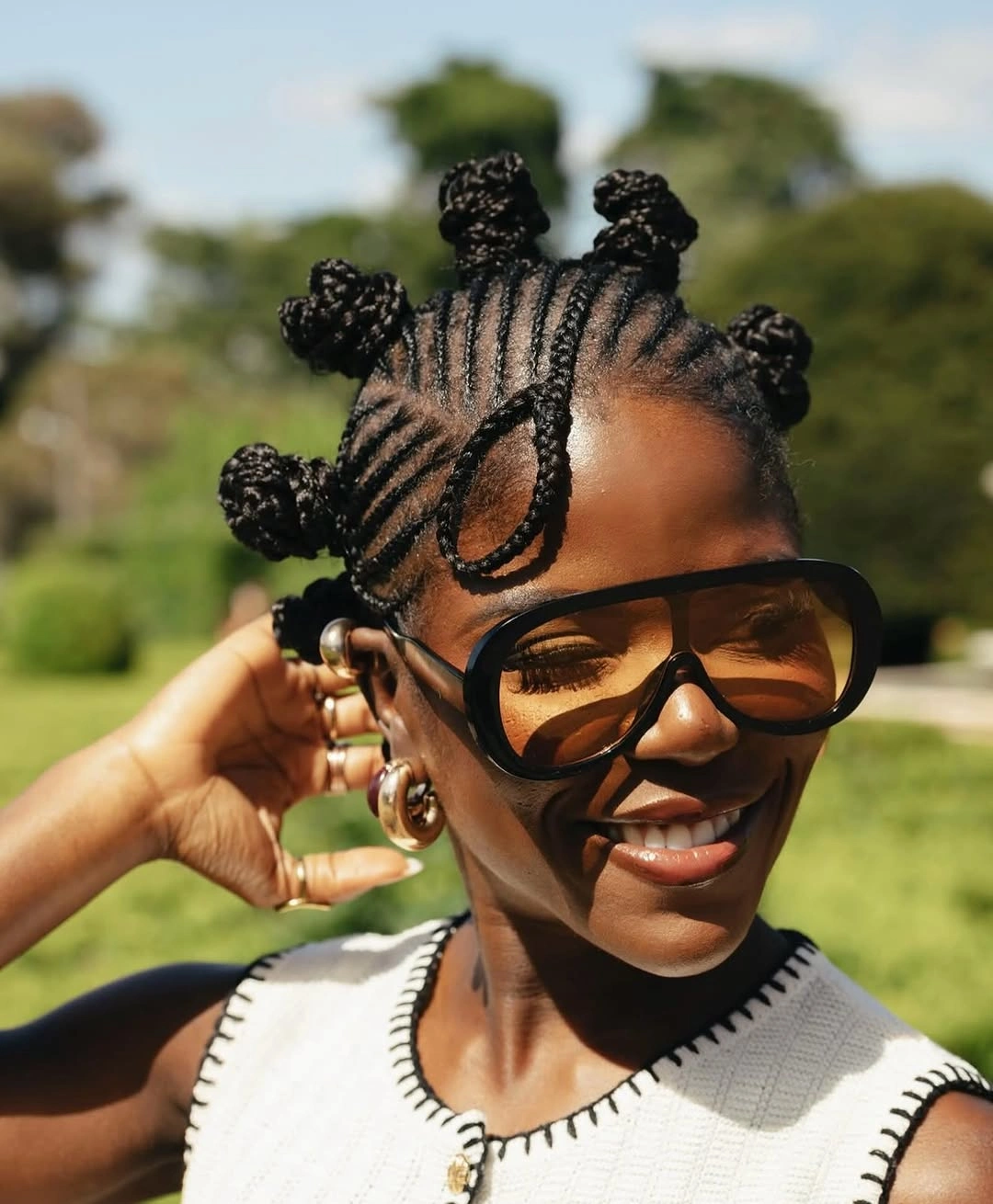 stunning bantu knots hairstyles Minimalist Bantu Knots with a Statement Accent Braid