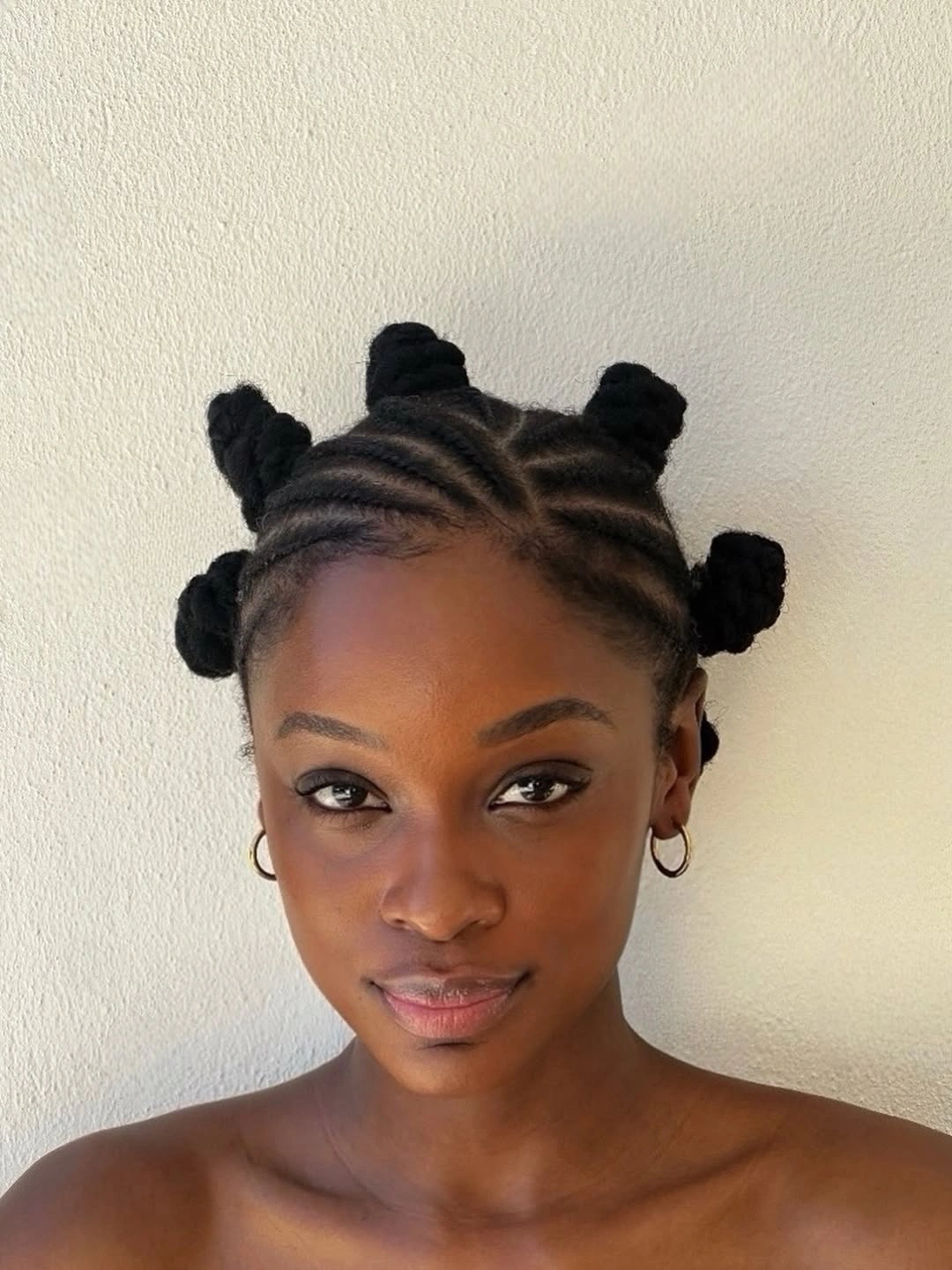 stunning bantu knots hairstyles Classic Bantu Knots with Clean Cornrow Sections