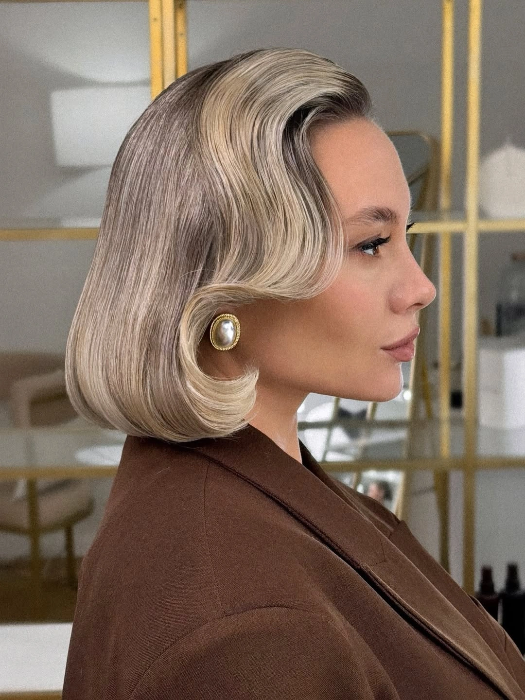 stylish body waves hairstyle Vintage Blonde Bob With Soft Waves