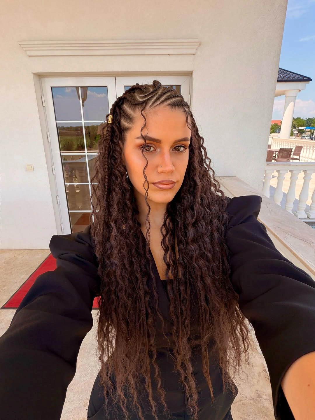 stylish bora bora braids hairstyle Half-Up Braided Crown With Loose Crimped Lengths