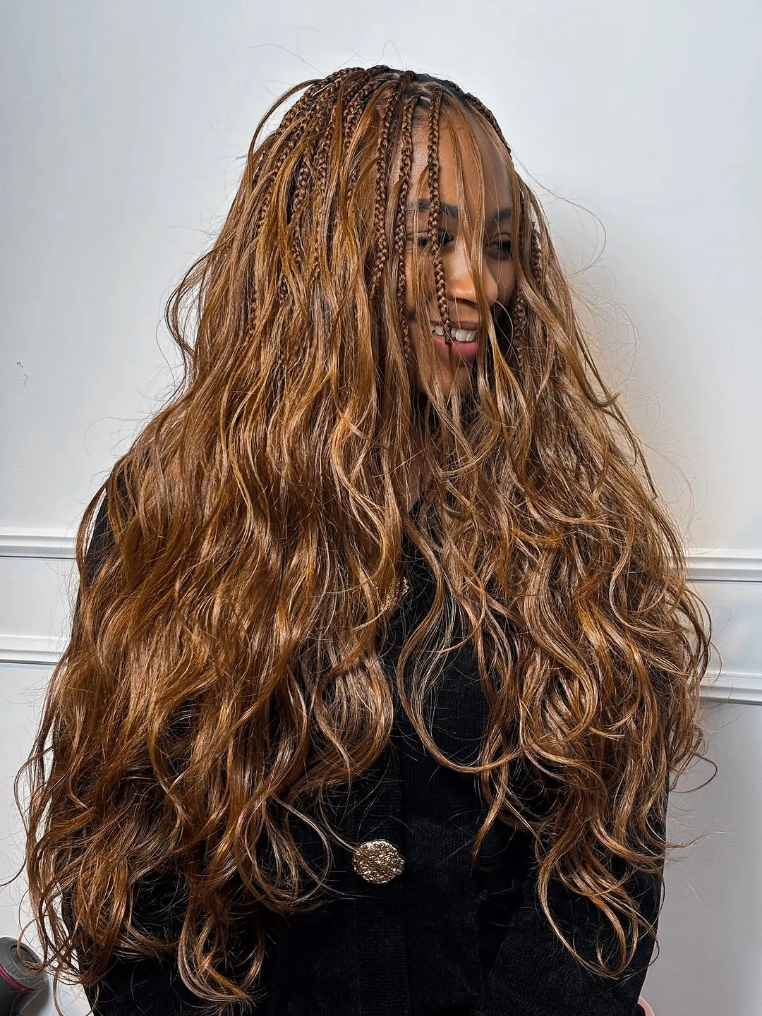 stylish bora bora braids hairstyle Warm Caramel Waves With Delicate Accent Braids