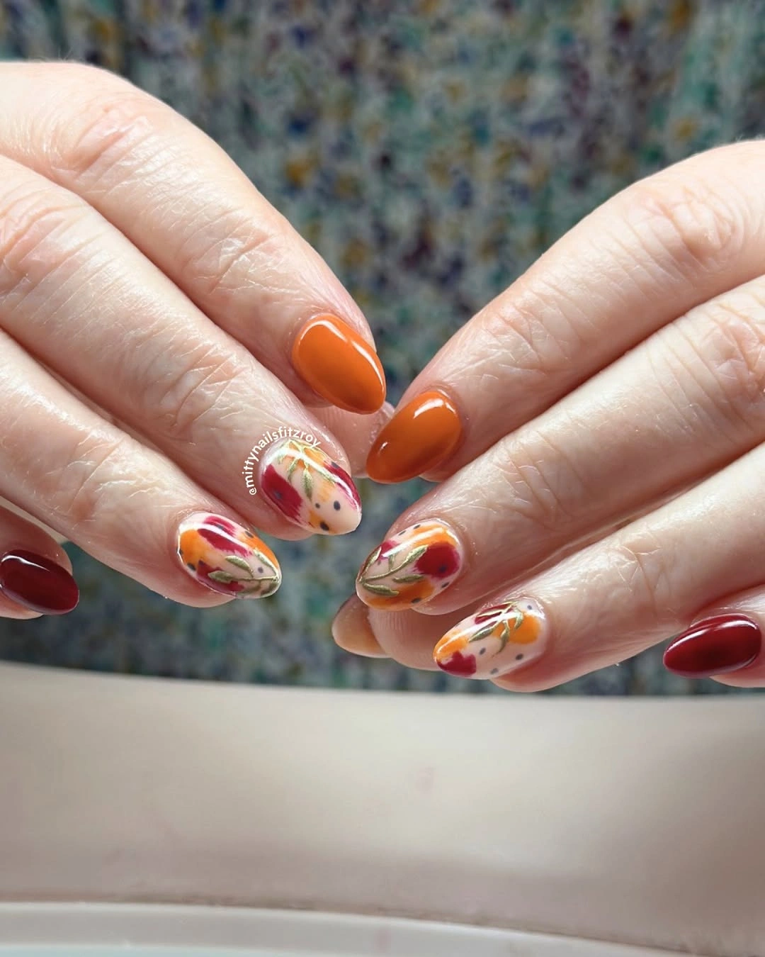 stylish fall acrylic nails 2026 Abstract Autumn Florals in Warm Orange