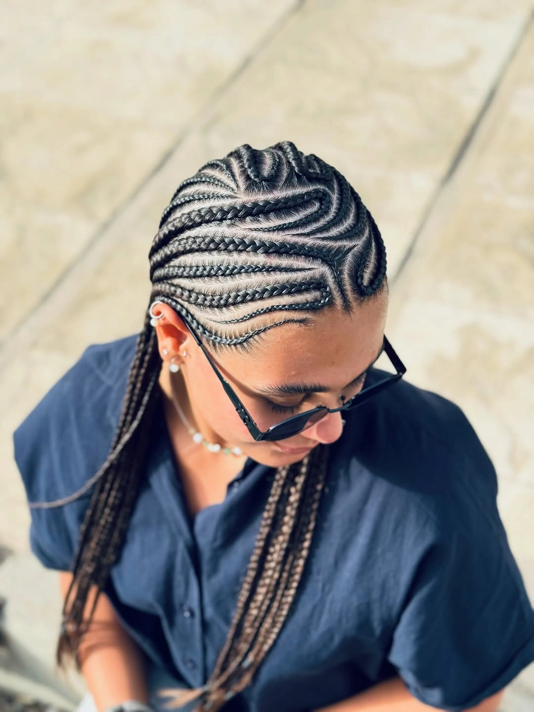 stylish feed in braid hairstyles Flowing Straight Back Braids with Sculpted Curved Parting