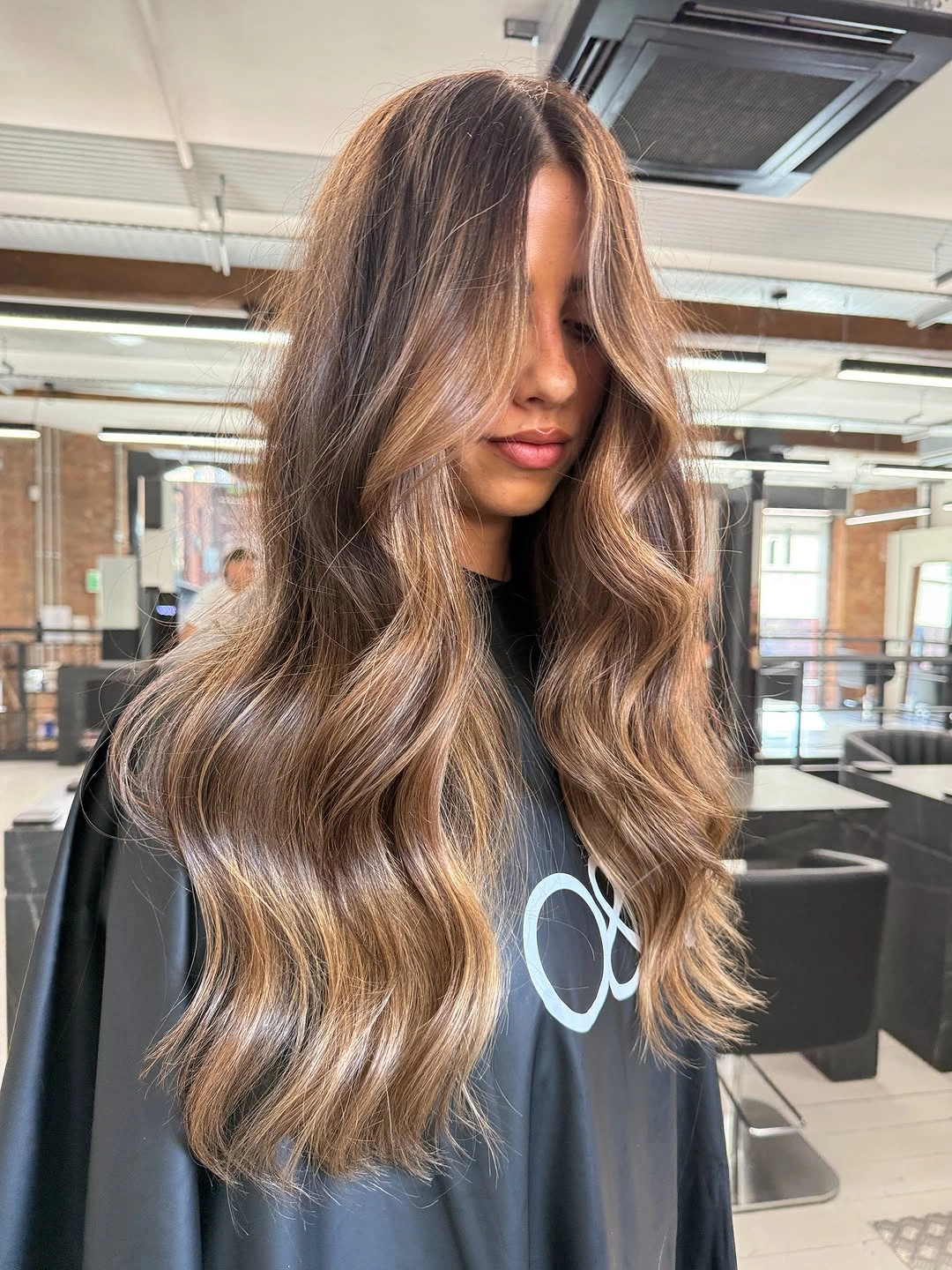 stylish hair lowlights: color ideas and inspiration Long Beige Brunette With Seamless Lowlights