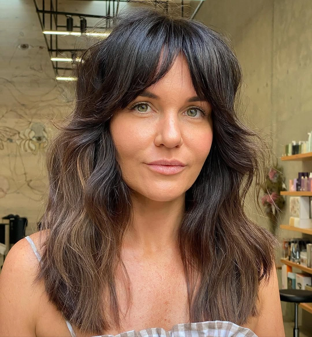 trendy choppy medium layered hair Feathered Layers With Curtain Bangs