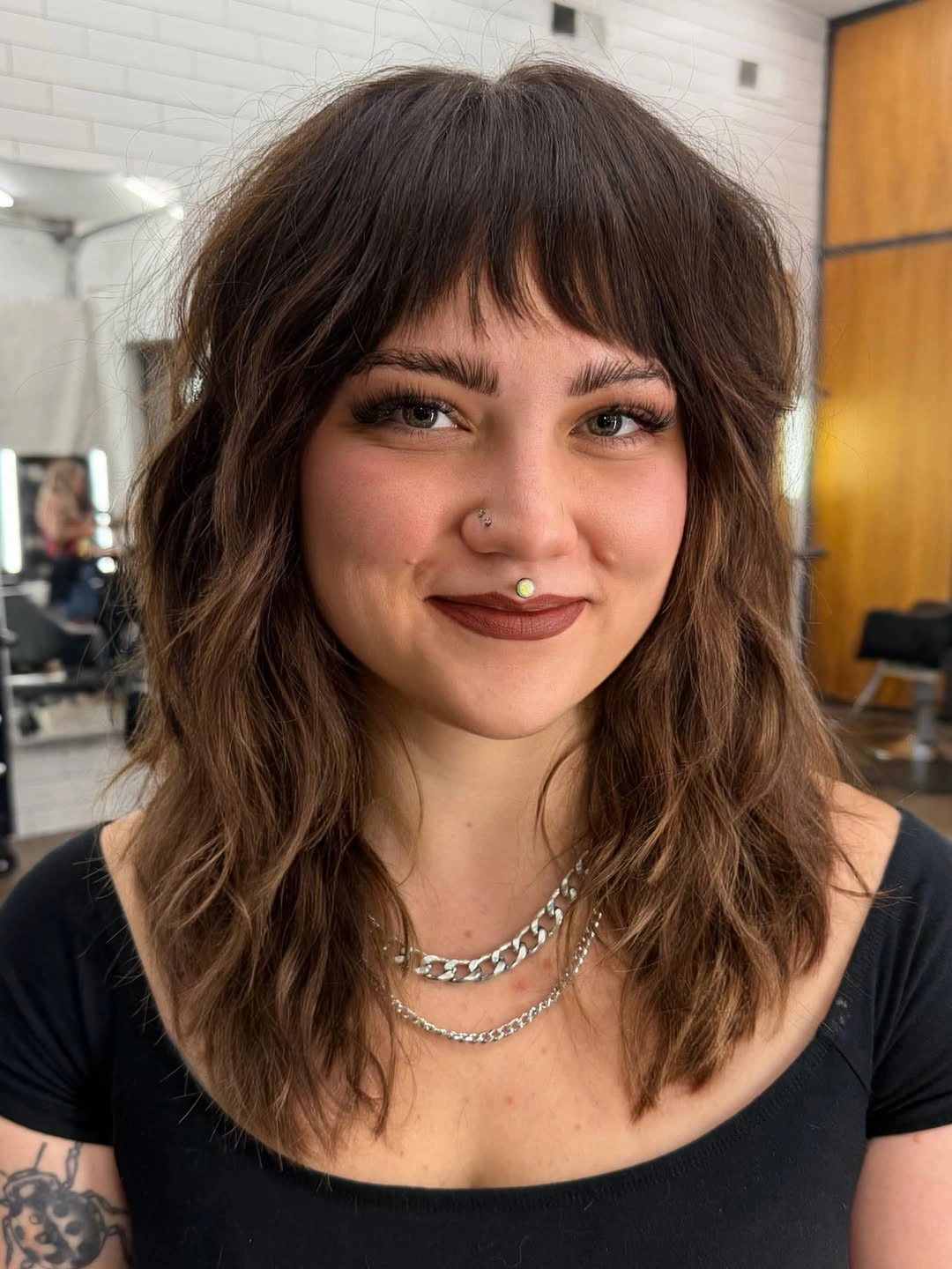 trendy choppy medium layered hair Textured Waves With Wispy Bangs