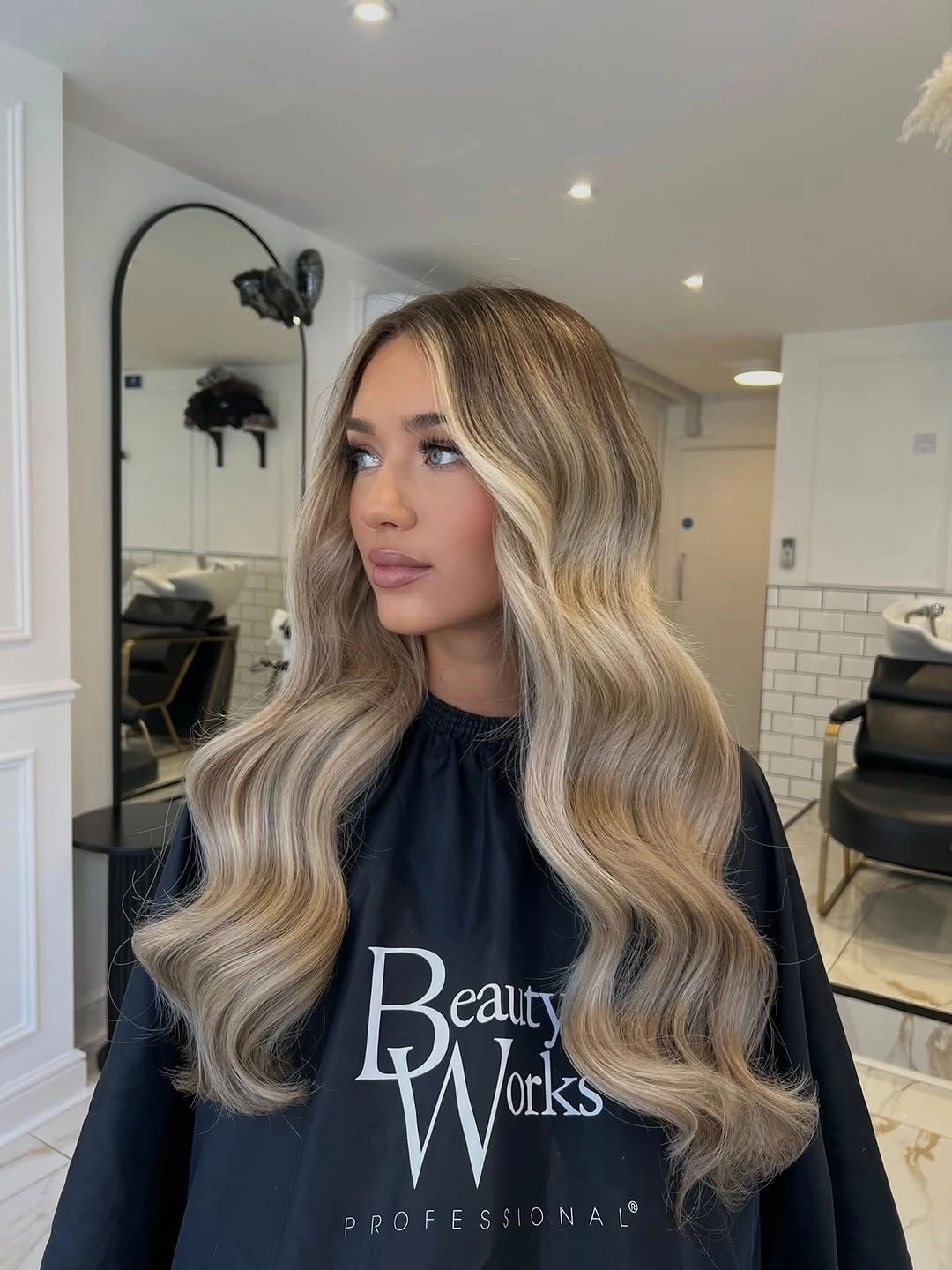 trendy dirty blonde hair color Glossy Mushroom Blonde Waves With Seamless Dimension