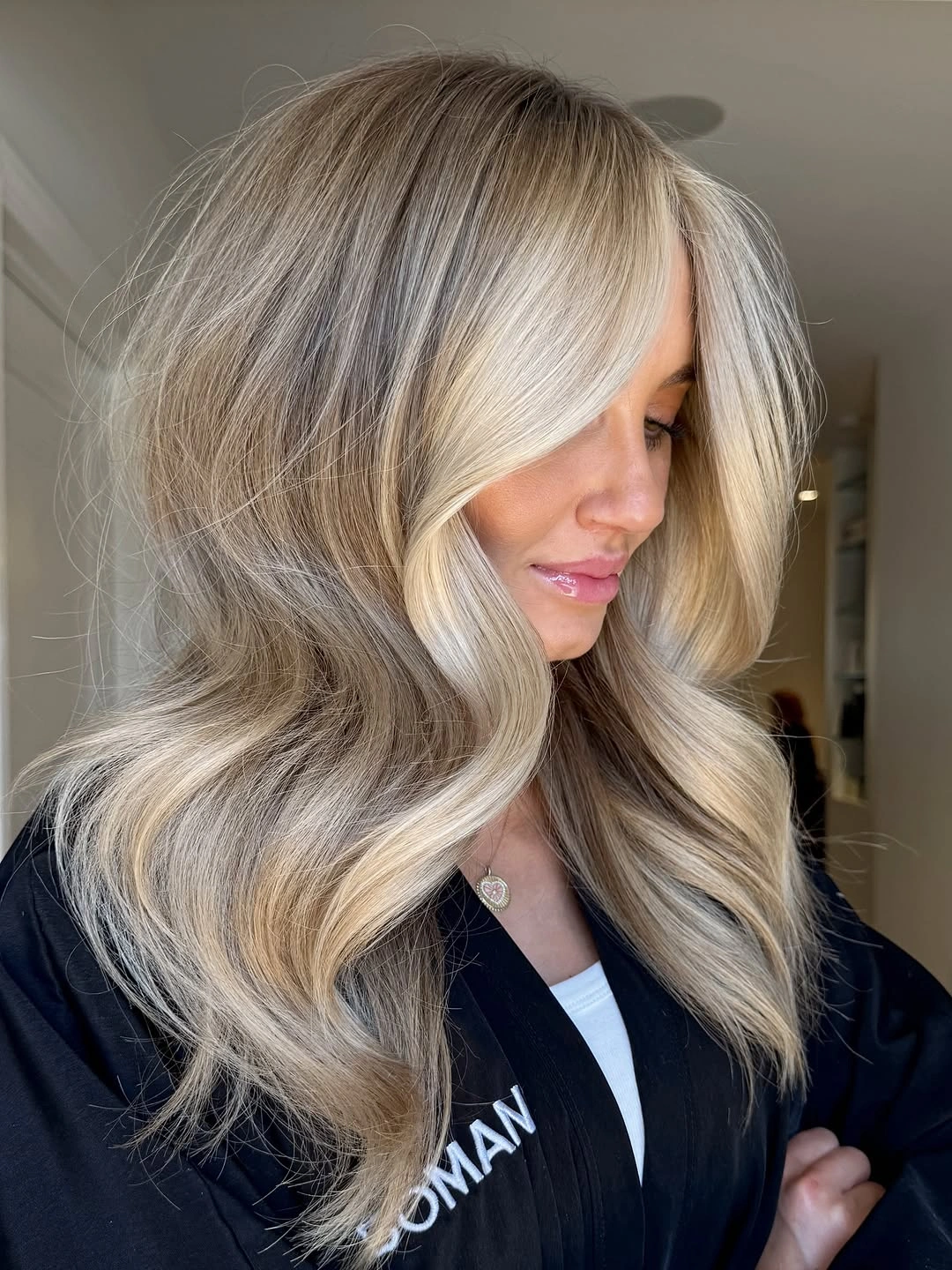 trendy dirty blonde hair color Luxury Smoky Blonde With Voluminous Layers
