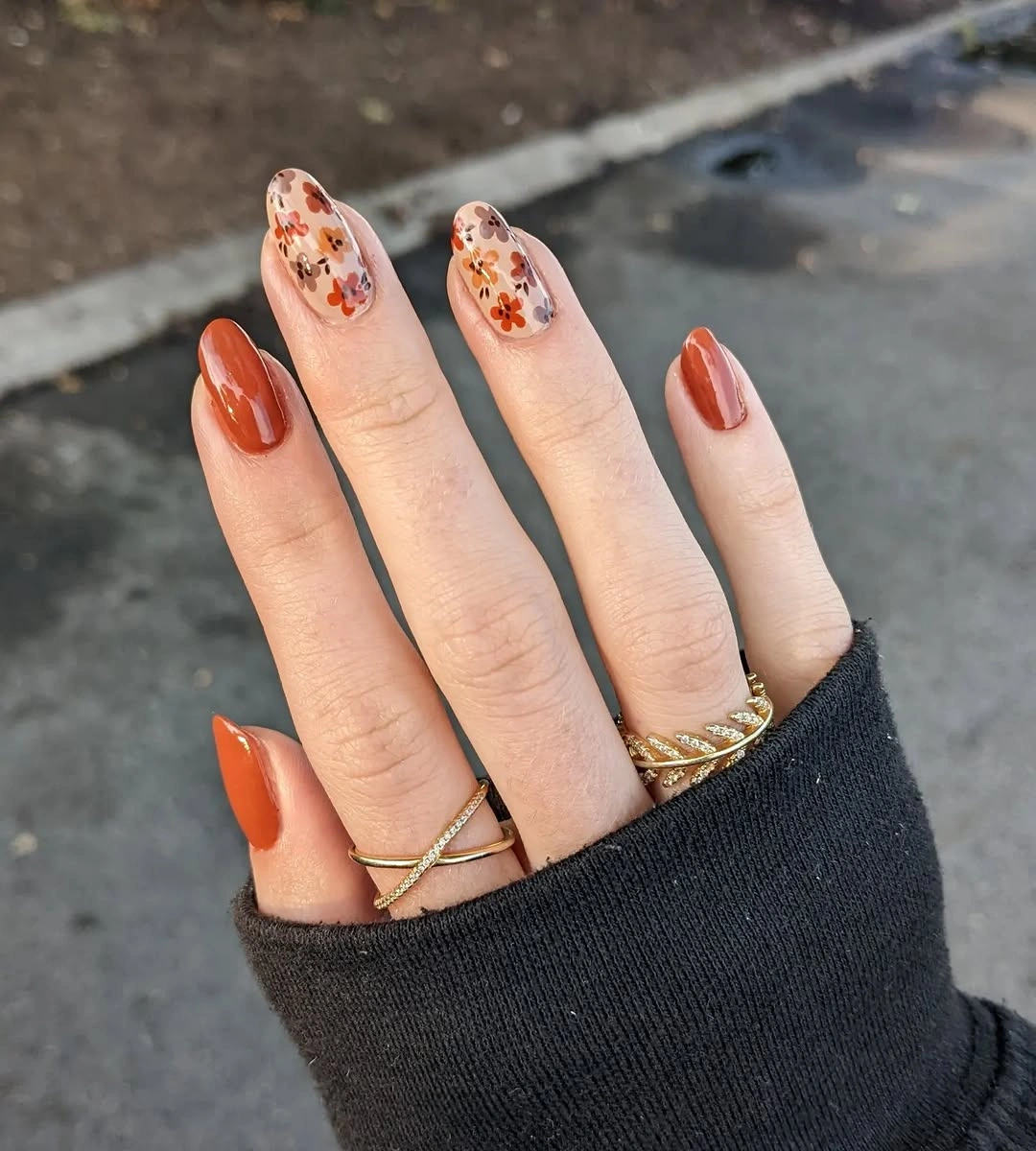 trendy fall nail designs for all skin tones 2026 Rust Floral Nails That Make Autumn Feel Softer