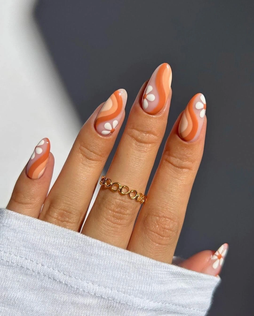 trendy fall nail designs for all skin tones 2026 Retro Pumpkin Waves with Daisy Accents