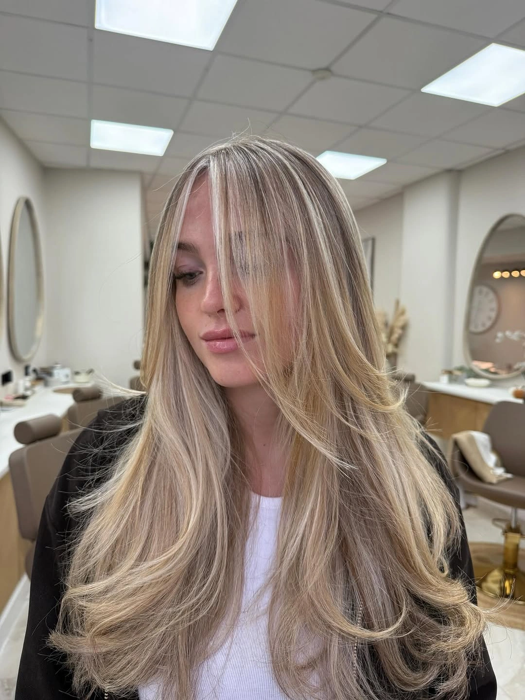 trendy full head babylights blonde on brown hair Soft Champagne Babylights With Airy Long Layers