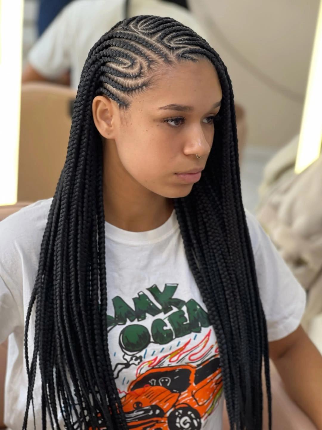 trendy lemonade braid hairstyle Symmetrical Swirls With Flawless Knotless Finish