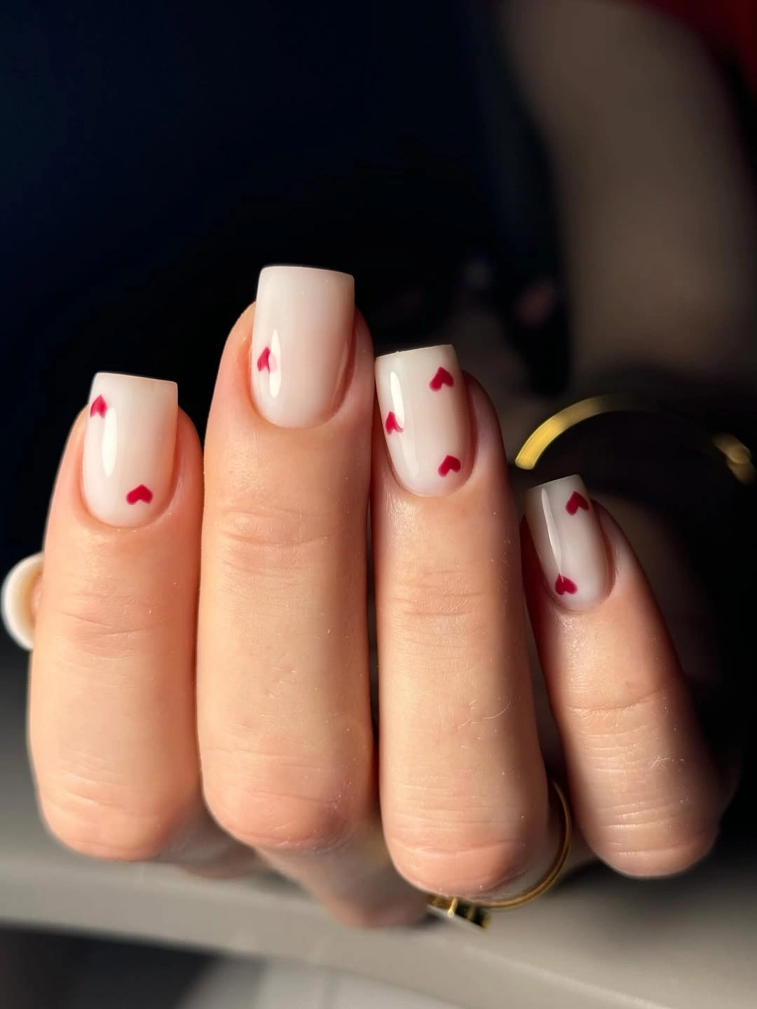 beautiful fall nails for fair skin tones 2026 Milky Nude Nails with Red Mini Hearts