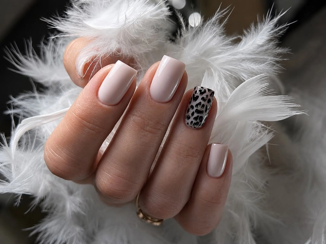 beautiful fall nails for fair skin tones 2026 Creamy Nude Nails with a Leopard Accent