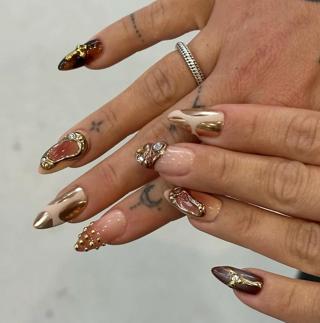 beautiful fall nails for tan skin tone Chocolate Chrome Almonds With Sculptural Gold Accents