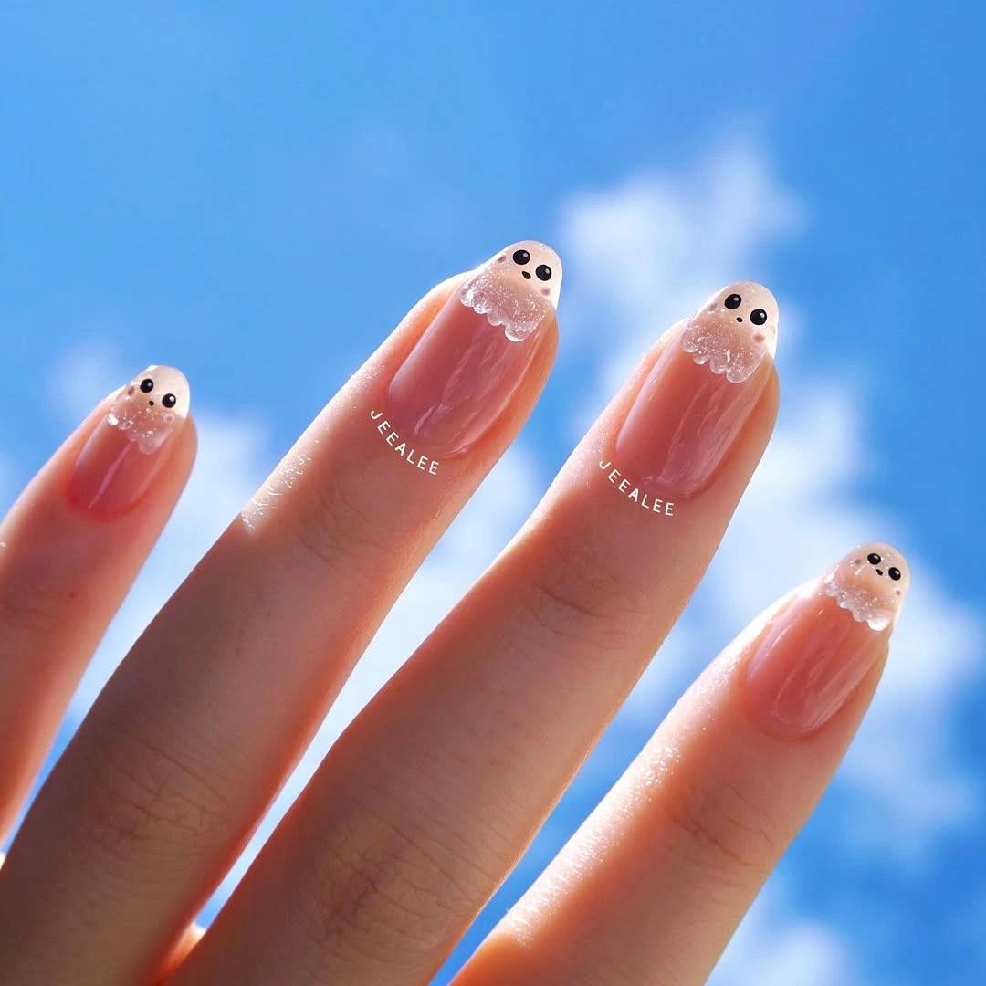 beautiful fall nails with autumn designs - Ghost Tip Nails With a Glossy Nude Base