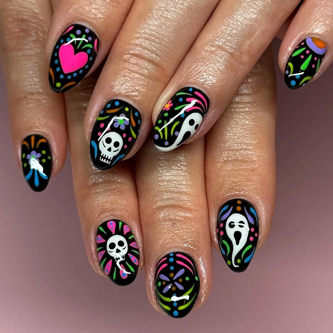 beautiful fall nails with autumn designs - Colorful Halloween Nails With Playful Skeletons