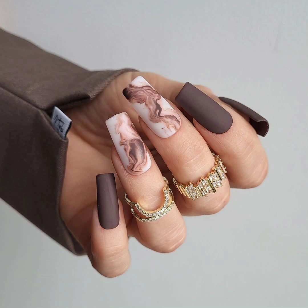 beautiful matte fall nails design 2026 Chocolate Marble Coffin Nails