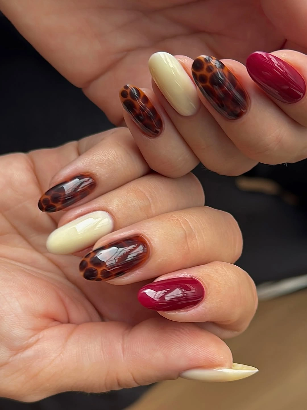 chic autumn nails color Tortoiseshell Cream and Burgundy for a Rich Fall Palette