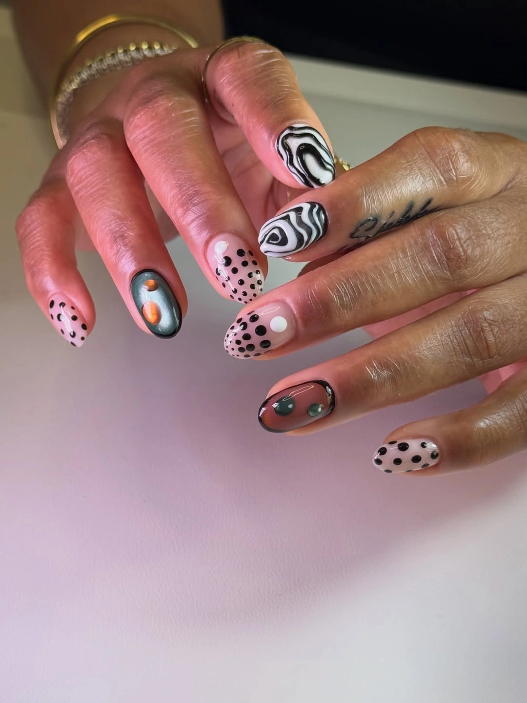 chic fall mid length nails 2026 Mixed Graphic Nail Art with Modern Monochrome Details