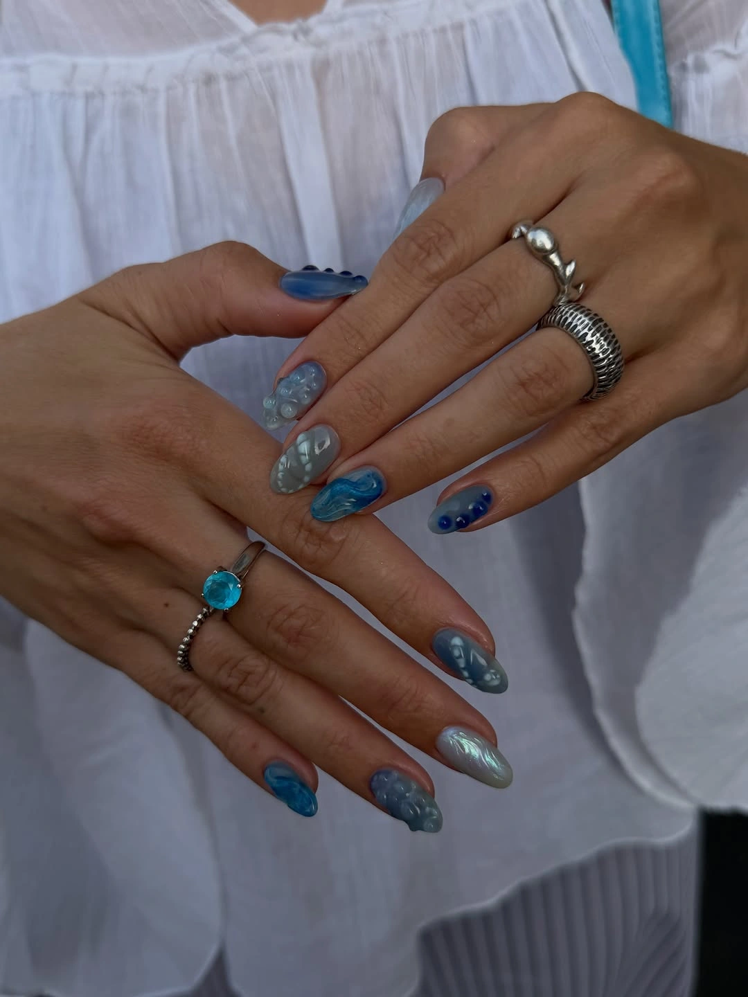 chic fall mid length nails 2026 Ocean-Inspired Blue Marble Nails for Moody Fall Days