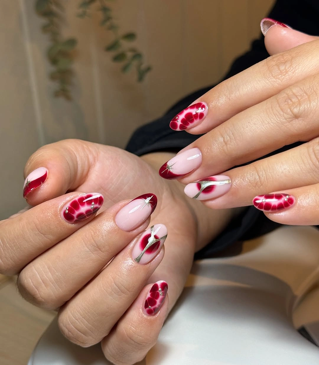 chic fall nail trends 2026 Modern Crimson Glass Nails