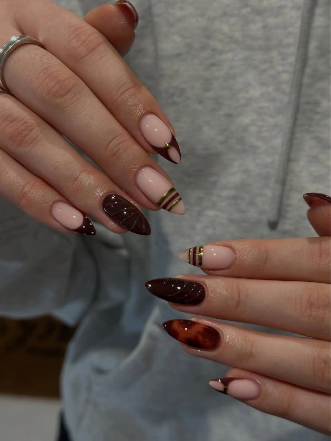 chic fall nail trends 2026 Chocolate French With Tortoiseshell Elegance