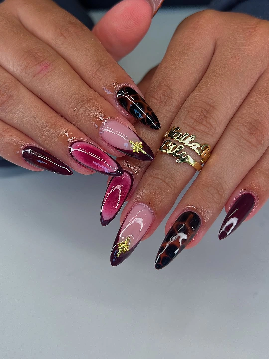 chic fall nail trends 2026 Deep Burgundy Glam With Modern Tortoiseshell