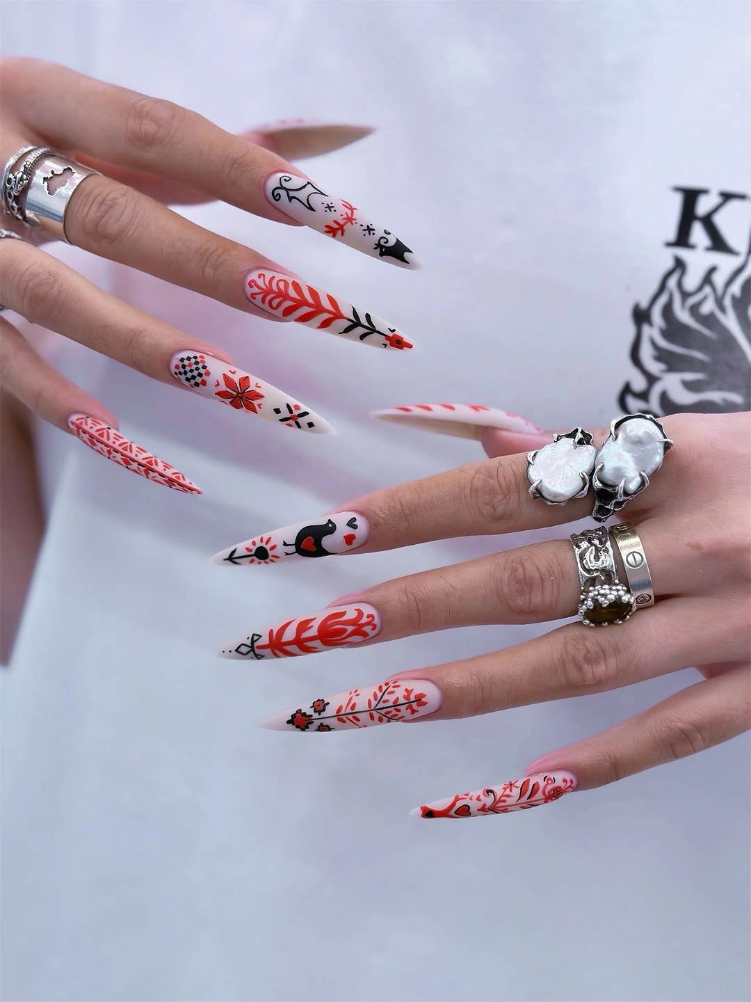 chic fall nails for fair skin tone red folk art botanical manicure