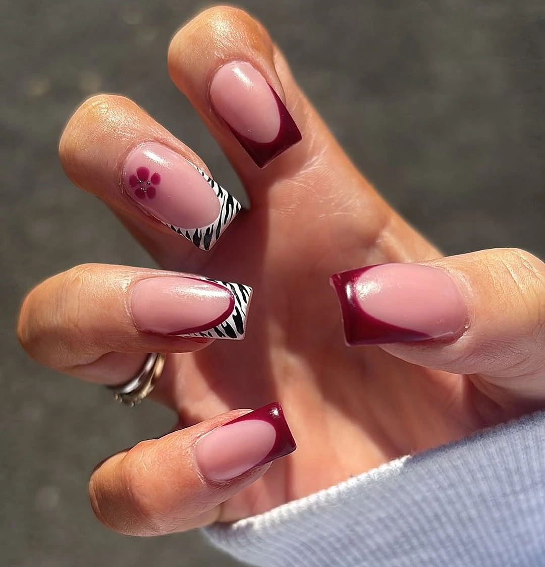 chic fall nails for medium skin tone Burgundy French With Zebra Accents